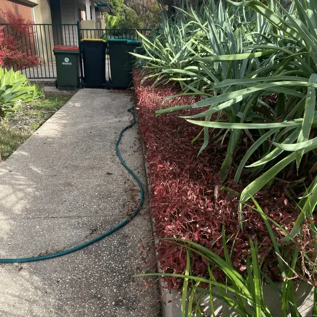 Green waste removal truck clearing branches prunings and garden debris from Bendigo property